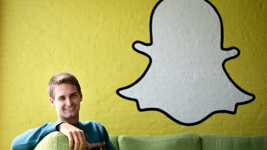 Snapchat CEO Evan Spiegel and logo